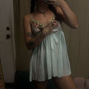 Chic White Chemise with Green and Red Lace Accents